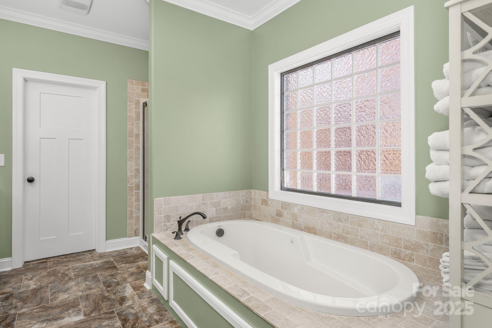 476 Ijames Church Road Mocksville, NC 27028 - Photo 19 of 48 a white bath tub and shower