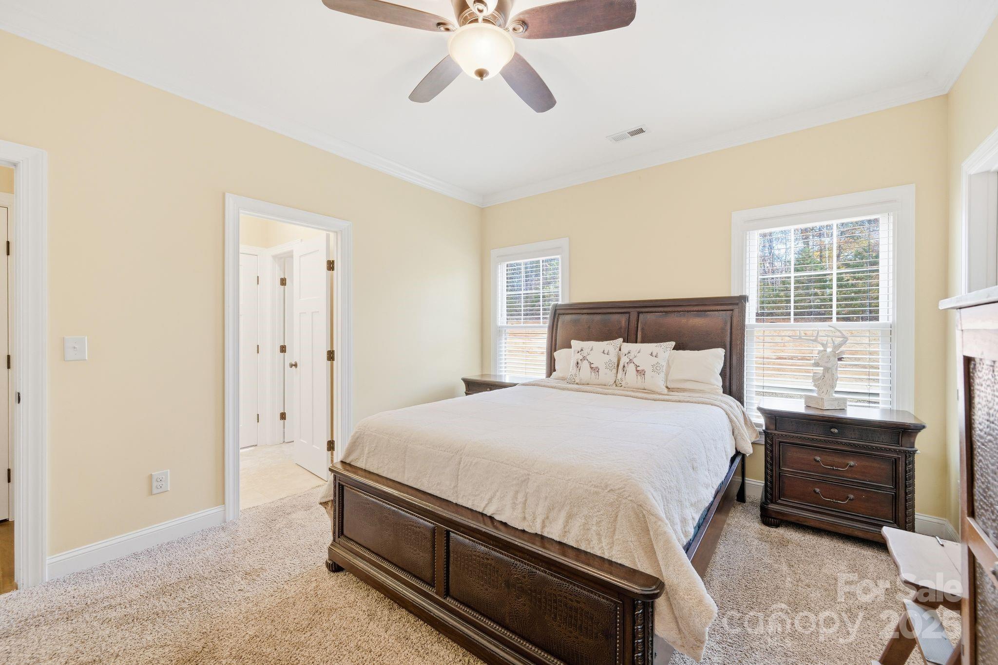 476 Ijames Church Road Mocksville, NC 27028 - Photo 22 of 48 a bedroom with a bed and a window