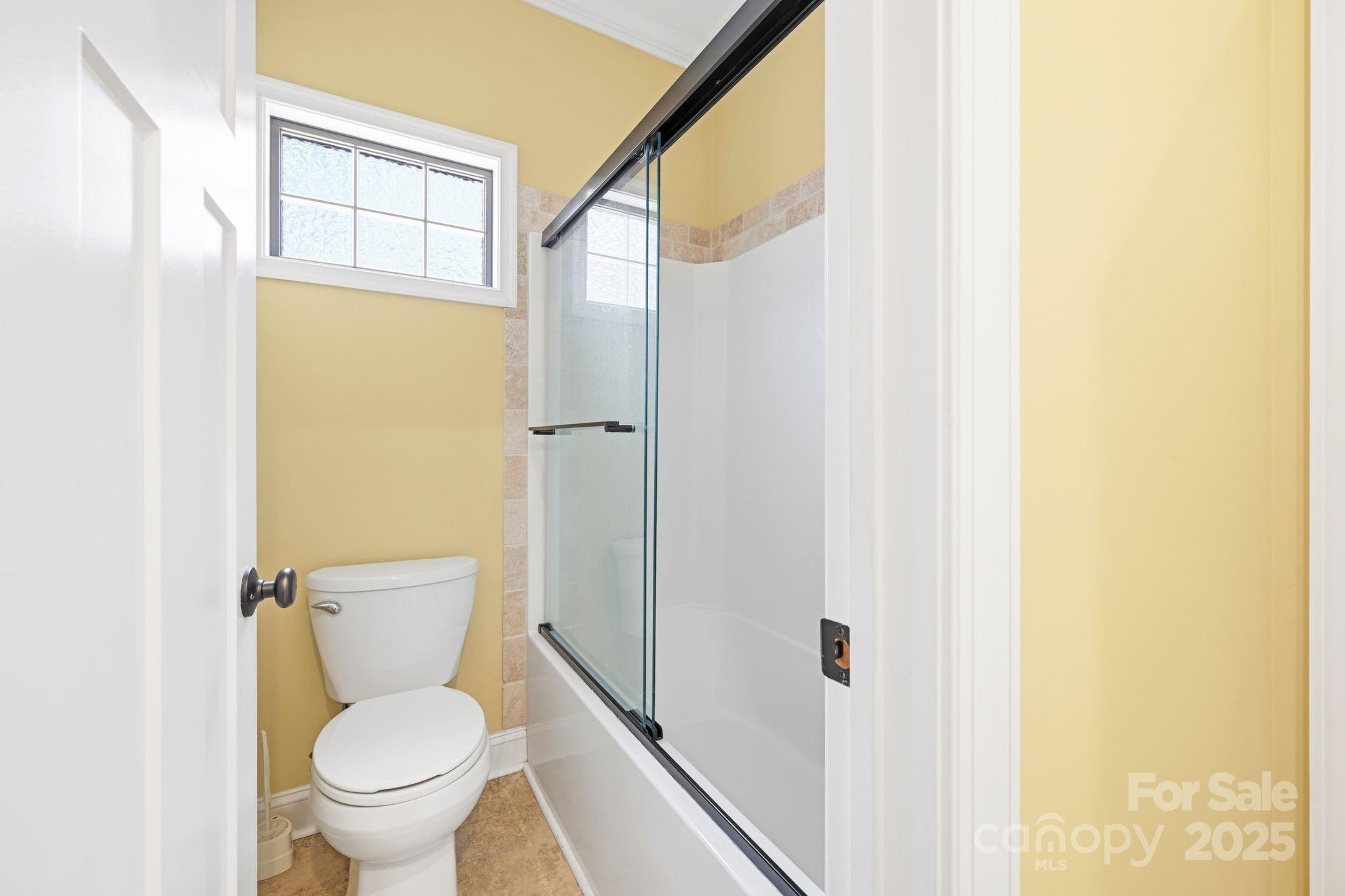 476 Ijames Church Road Mocksville, NC 27028 - Photo 24 of 48 a white toilet sitting next to a bathroom sink