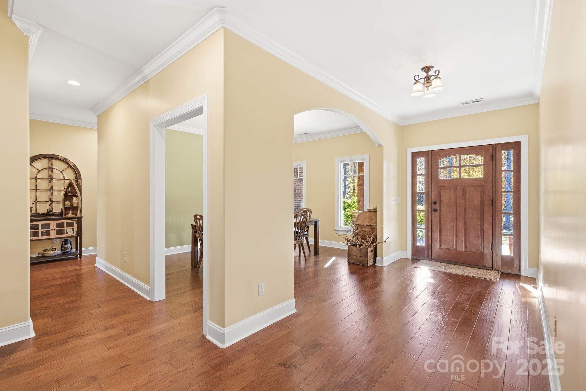 476 Ijames Church Road Mocksville, NC 27028 - Photo 3 of 48 a view of a livingroom with furniture and hardwood floor
