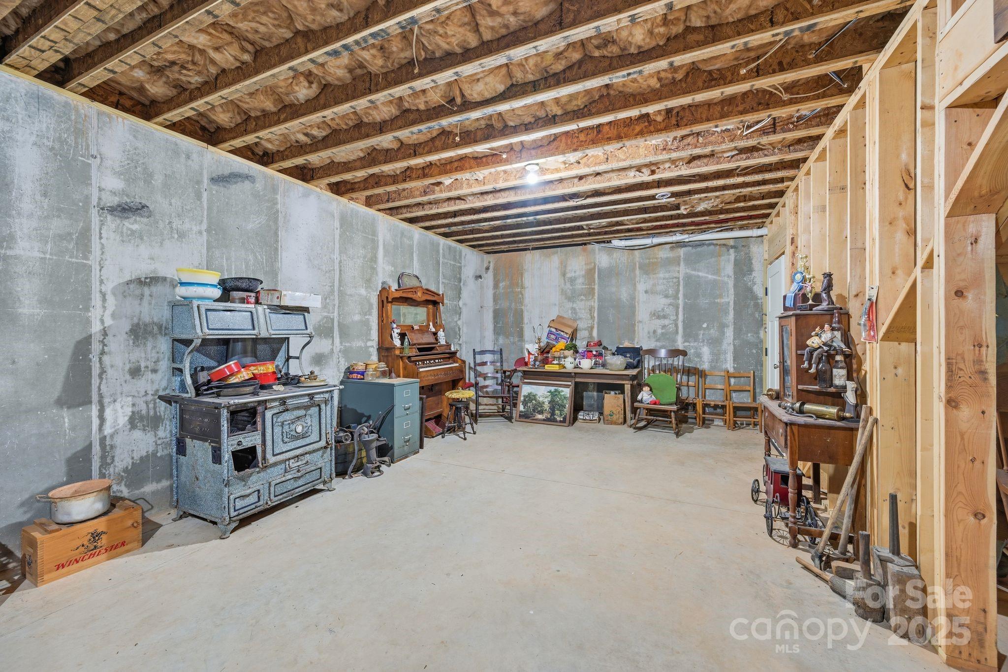 476 Ijames Church Road Mocksville, NC 27028 - Photo 37 of 48 a storage room with lots of wooden furniture