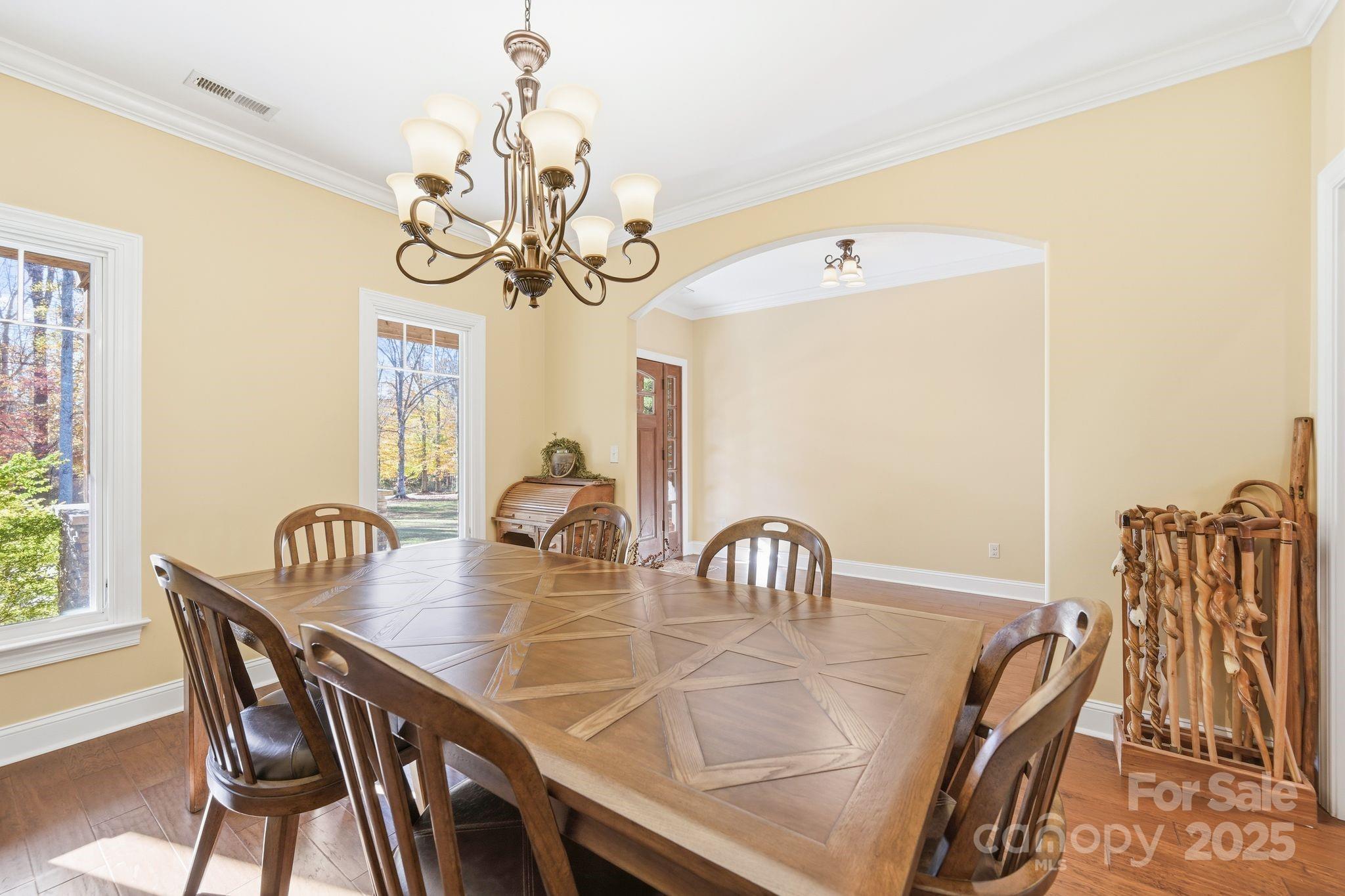 476 Ijames Church Road Mocksville, NC 27028 - Photo 4 of 48 a view of a dining room with furniture and chandelier