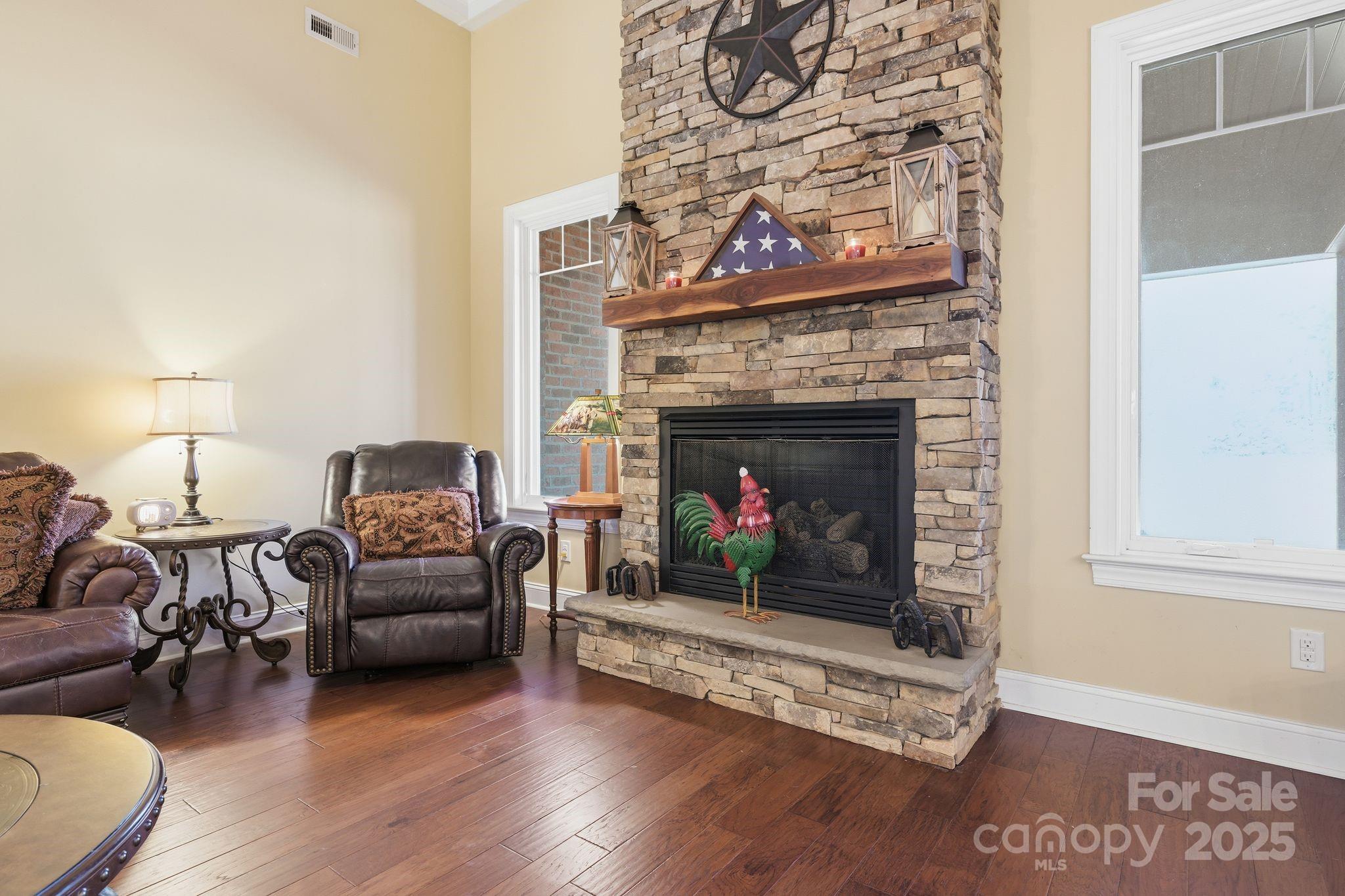 476 Ijames Church Road Mocksville, NC 27028 - Photo 6 of 48 a living room with furniture a fireplace and a table
