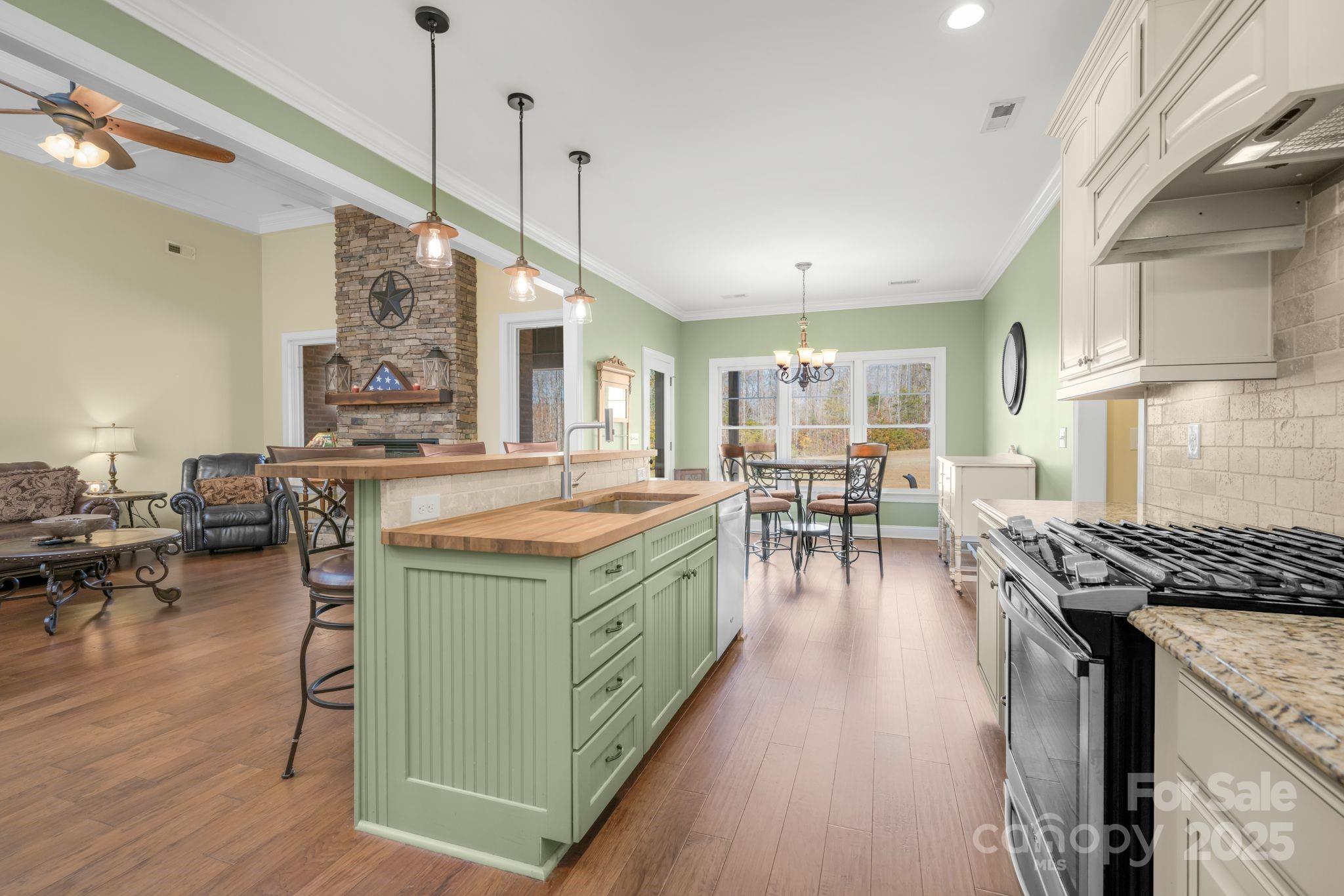 476 Ijames Church Road Mocksville, NC 27028 - Photo 10 of 48 a kitchen with sink stove and cabinets