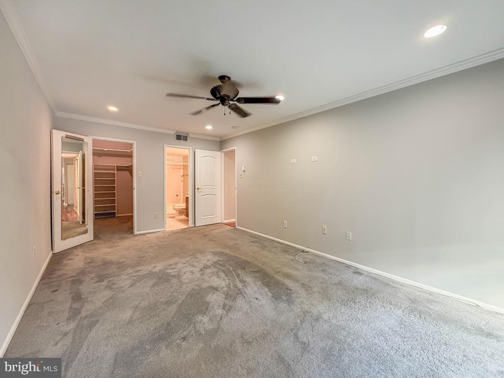 1680 Huntingdon Pike, Unit CONDO 232 Huntingdon Valley, PA 19006 - Photo 24 of 34 a view of an empty room with a ceiling fan