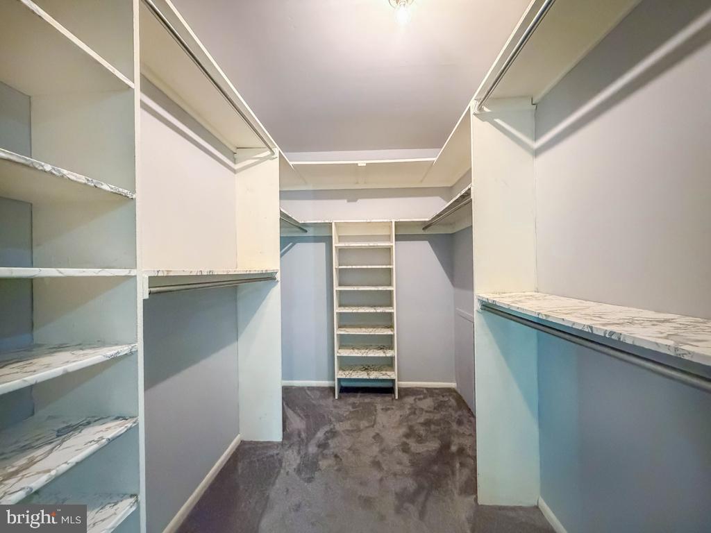 1680 Huntingdon Pike, Unit CONDO 232 Huntingdon Valley, PA 19006 - Photo 25 of 34 a view of walk in closet with empty racks