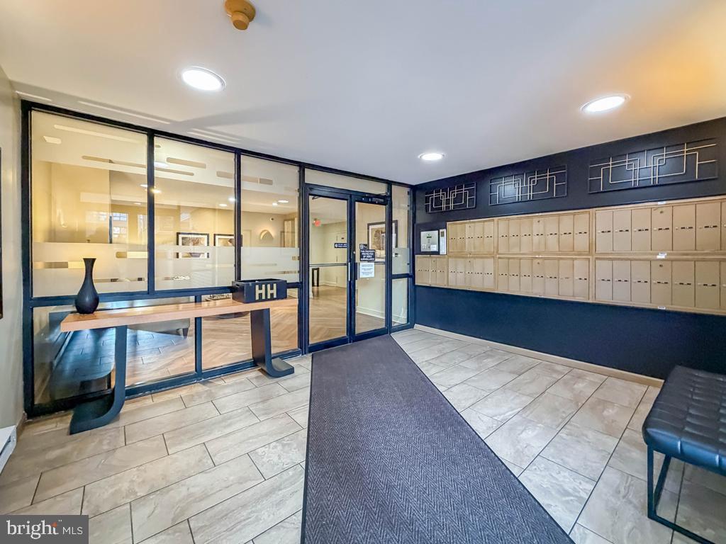 1680 Huntingdon Pike, Unit CONDO 232 Huntingdon Valley, PA 19006 - Photo 5 of 34 a large living room with a large window