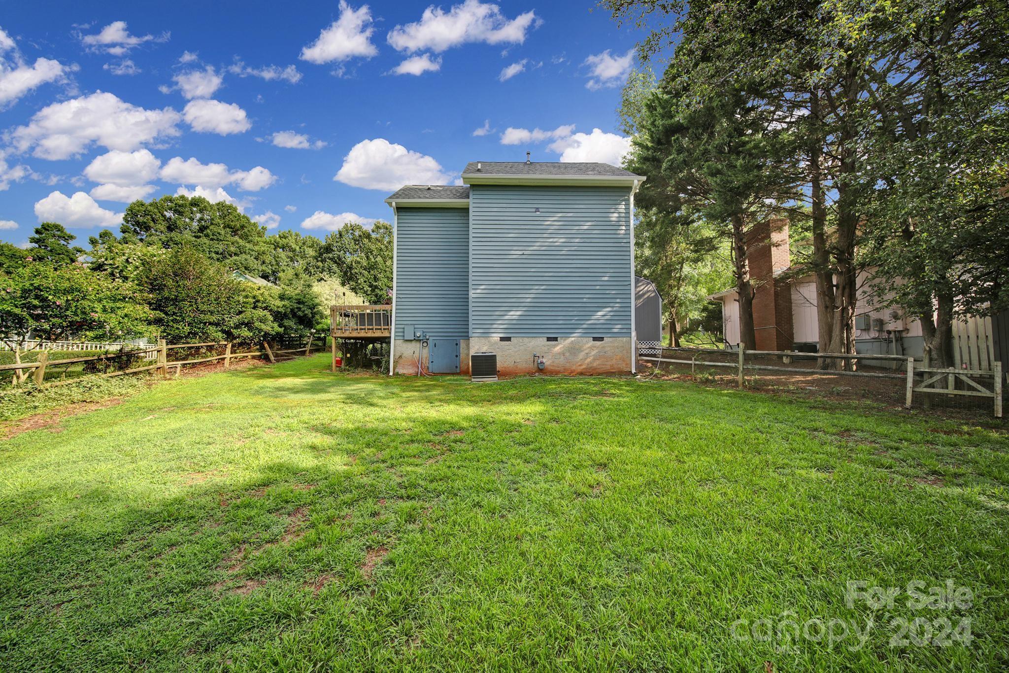 9119 Windjammer Drive Tega Cay, SC 29708 - Photo 39 of 40 a view of a house with a yard