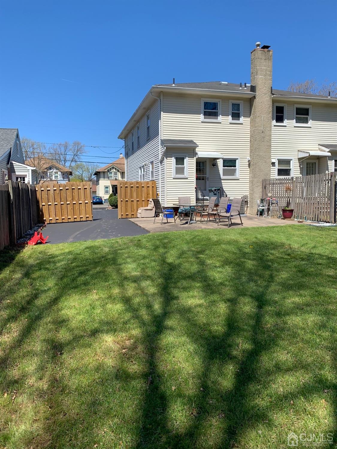 406 Chestnut Street Middlesex, NJ 08846 - Photo 16 of 16 a view of a house with a yard
