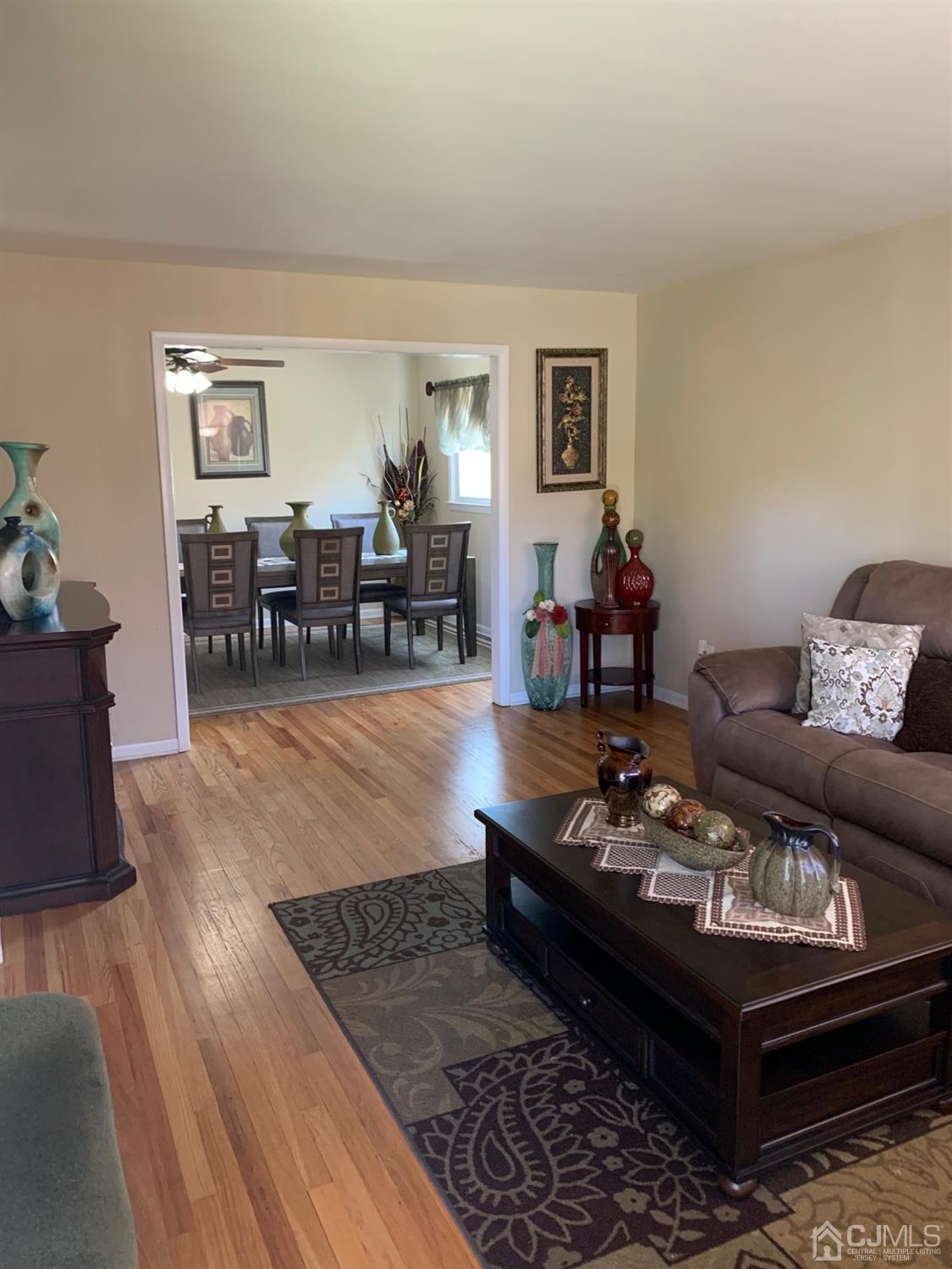 406 Chestnut Street Middlesex, NJ 08846 - Photo 2 of 16 a living room with furniture and wooden floor