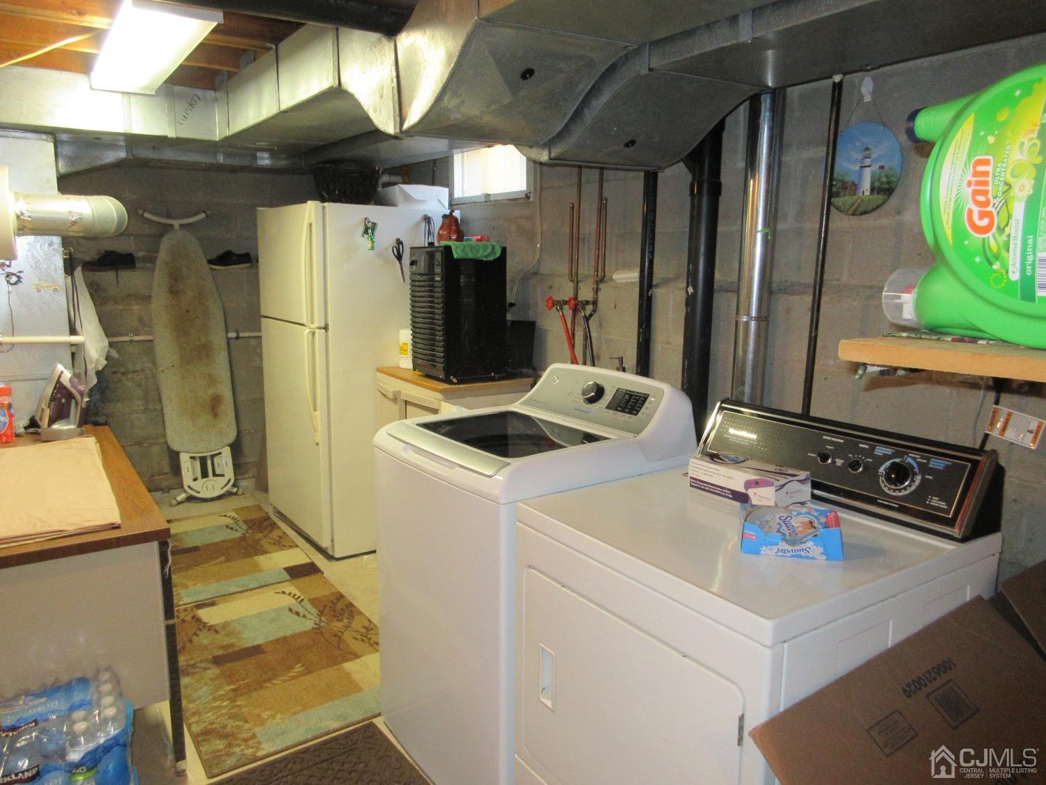 406 Chestnut Street Middlesex, NJ 08846 - Photo 10 of 16 a room with storage and utility