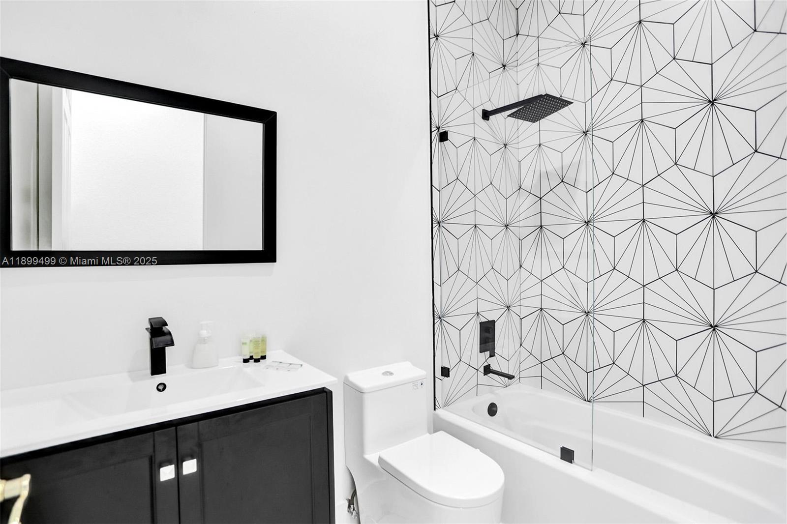 3152 Southwest 147th Avenue Davie, FL 33330 - Photo 19 of 38 a bathroom with a bathtub and a sink