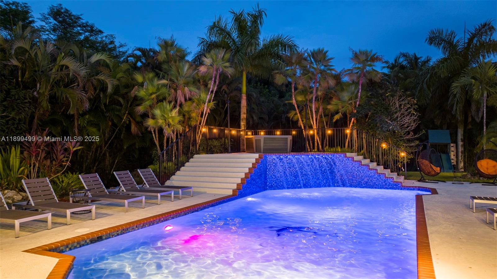 3152 Southwest 147th Avenue Davie, FL 33330 - Photo 3 of 38 swimming pool with patio outdoor seating and yard