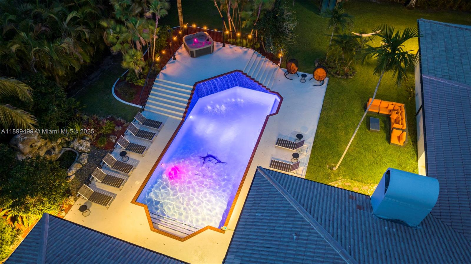 3152 Southwest 147th Avenue Davie, FL 33330 - Photo 5 of 38 swimming pool view with a garden and stairs