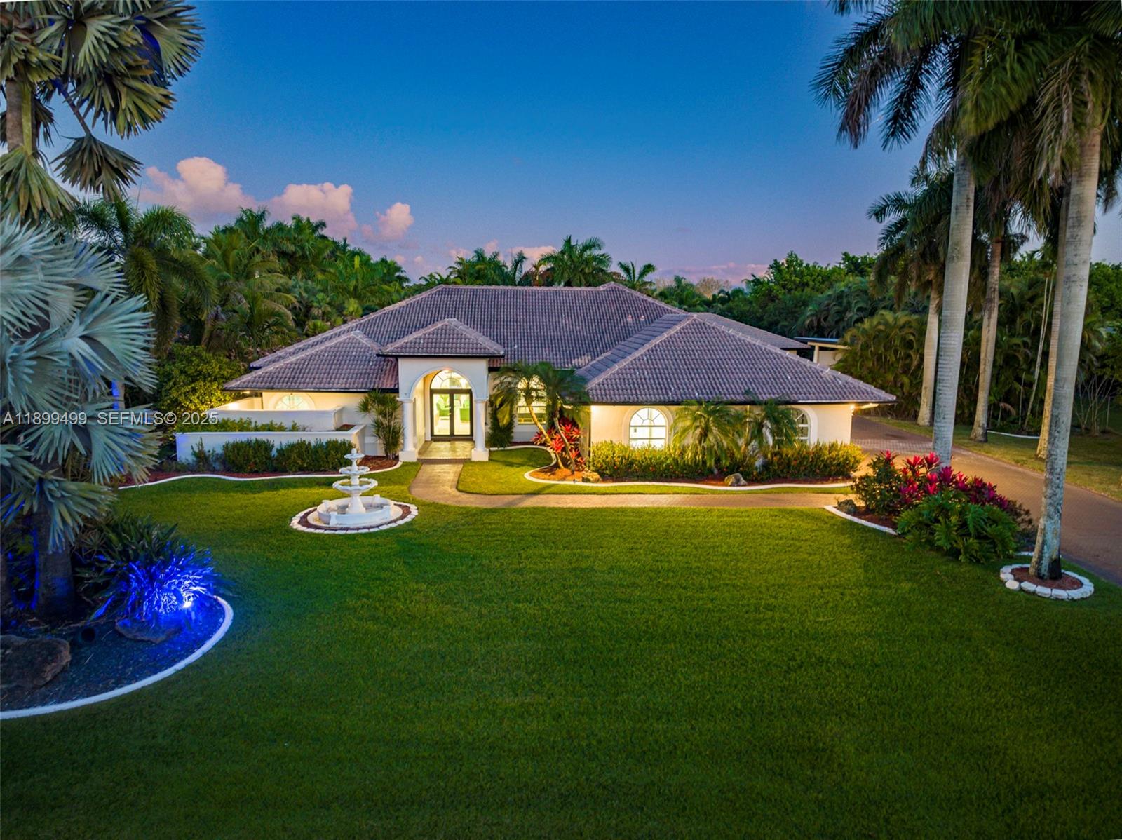 3152 Southwest 147th Avenue Davie, FL 33330 - Photo 10 of 38 a view of an house with backyard space and garden