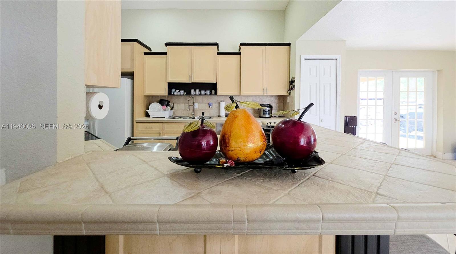 355 North Lindero Street Clewiston, FL 33440 - Photo 15 of 30 a spacious bedroom with a bed and a window