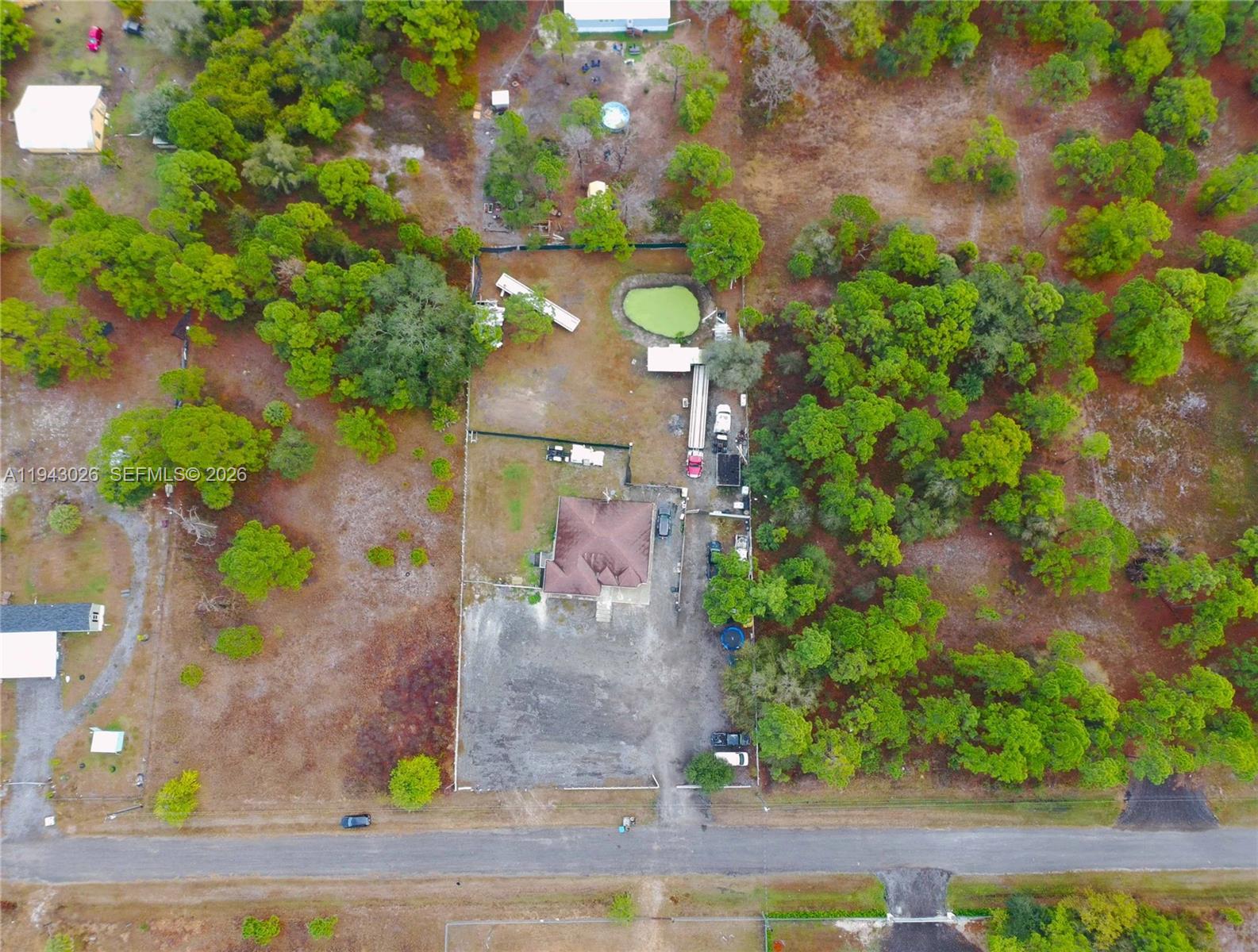 355 North Lindero Street Clewiston, FL 33440 - Photo 27 of 30 a view of a yard