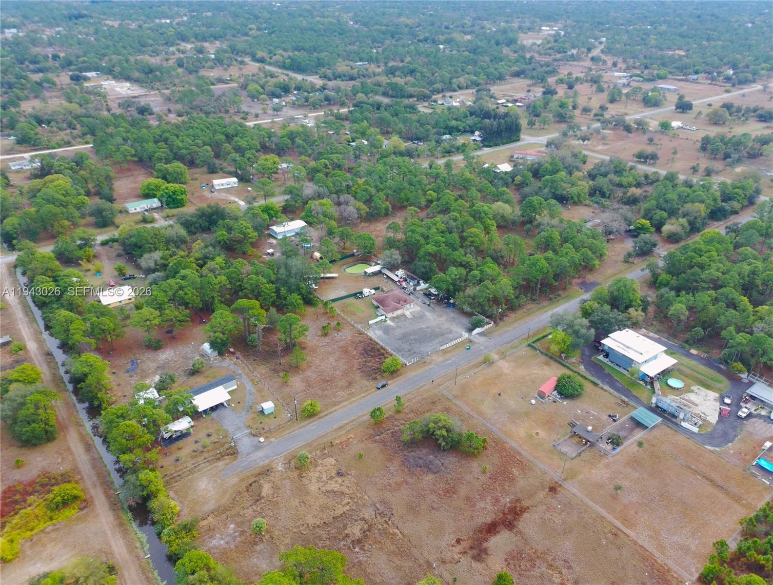 355 North Lindero Street Clewiston, FL 33440 - Photo 29 of 30 an aerial view of a city with lots of residential buildings