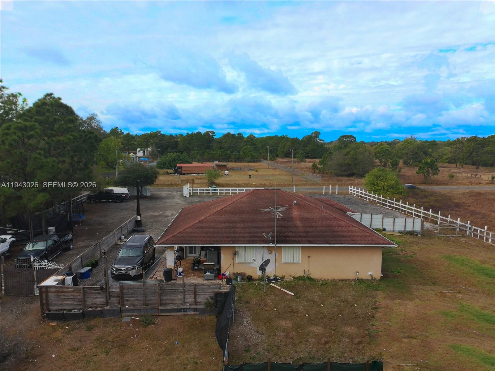 355 North Lindero Street Clewiston, FL 33440 - Photo 30 of 30 a view of a town with mountains in the background