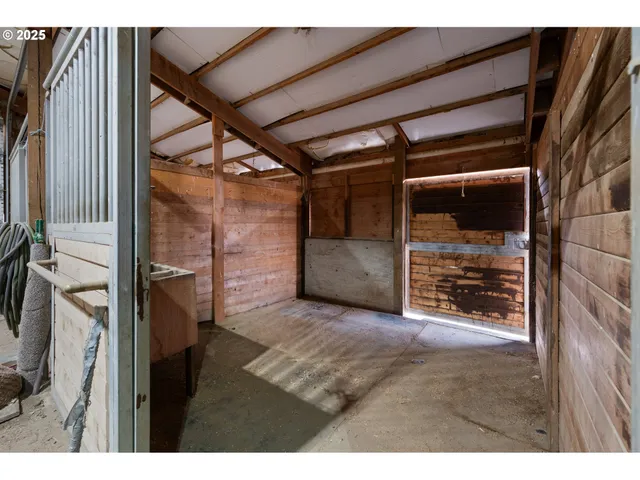 a view of an empty room with a glass door