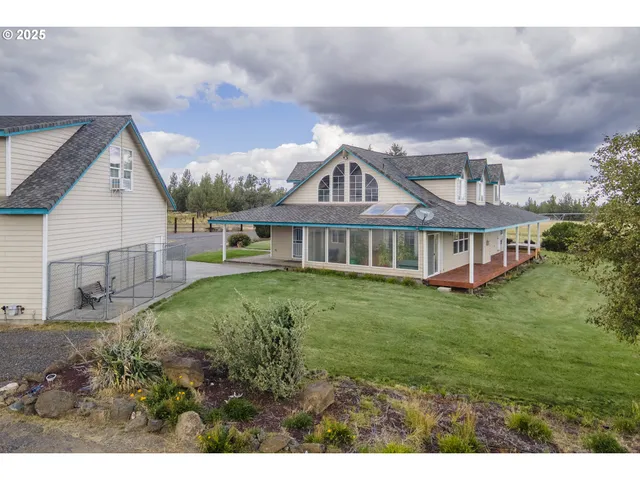 a view of an ocean and a yard