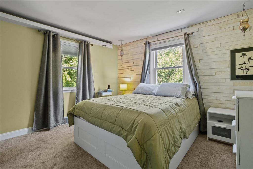 1129 Edith Avenue Pittsburgh, PA 15236 - Photo 13 of 25 a bedroom with a bed and a window