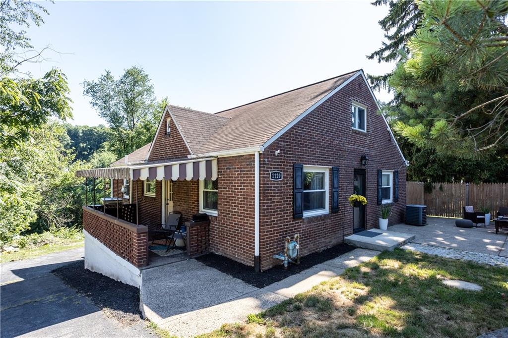 1129 Edith Avenue Pittsburgh, PA 15236 - Photo 2 of 25 a view of a house with backyard and sitting area