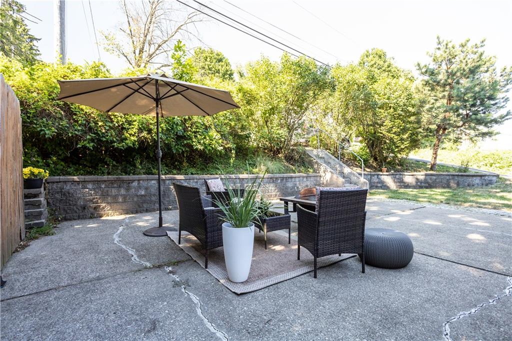 1129 Edith Avenue Pittsburgh, PA 15236 - Photo 22 of 25 a view of a chairs and table in the patio