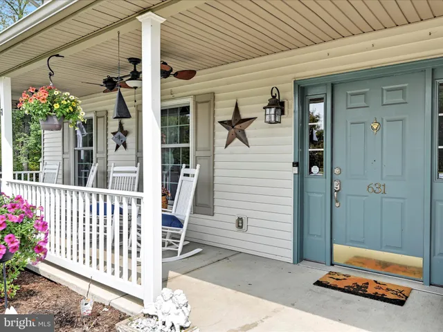 a view of a porch with a bench