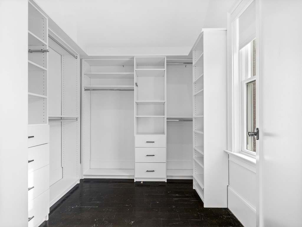 131 Centre Street Boston, MA 02124 - Photo 24 of 26 a view of an empty walk in closet