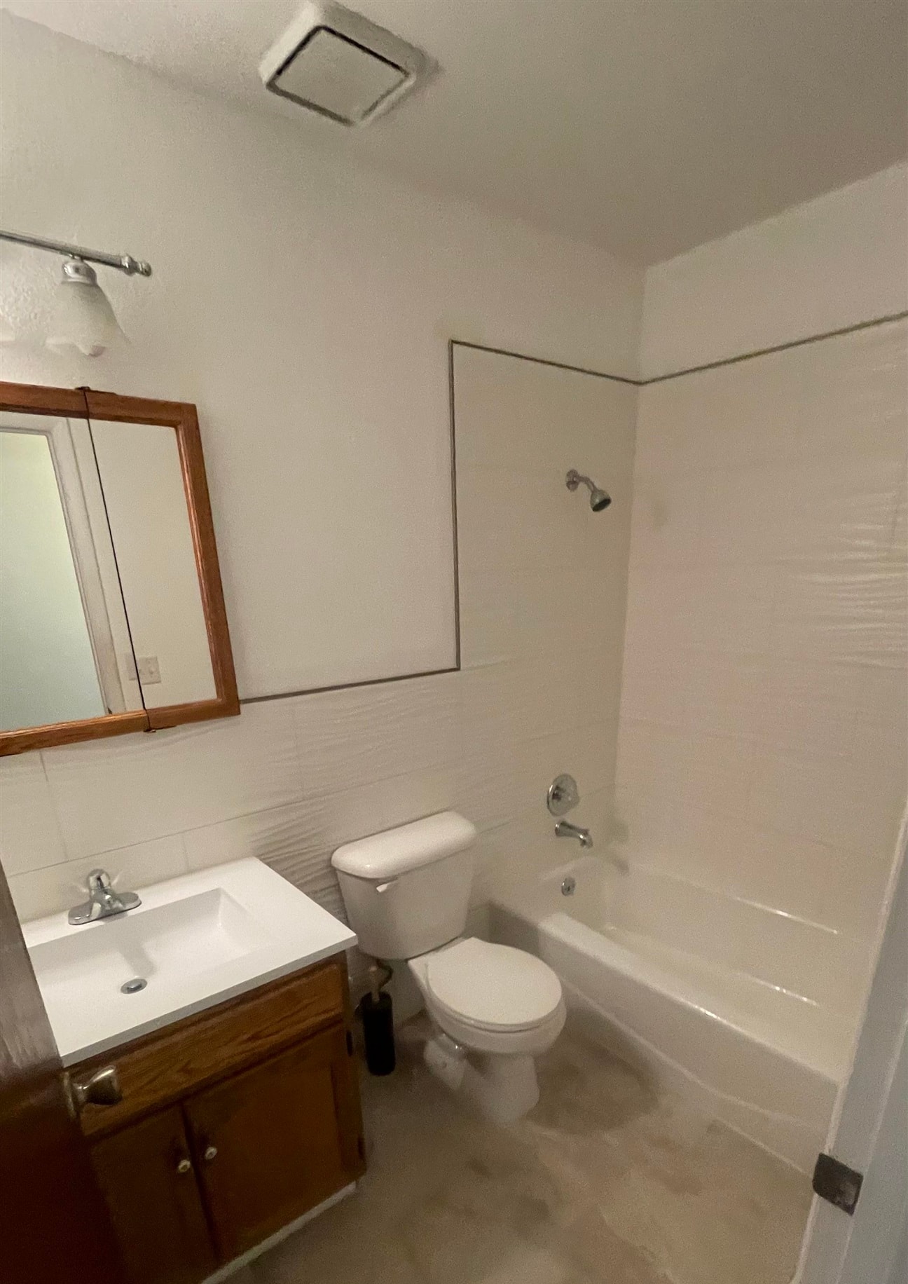 3374 G Road Clifton, CO 81520 - Photo 17 of 24 a bathroom with a white sink a toilet a mirror and shower