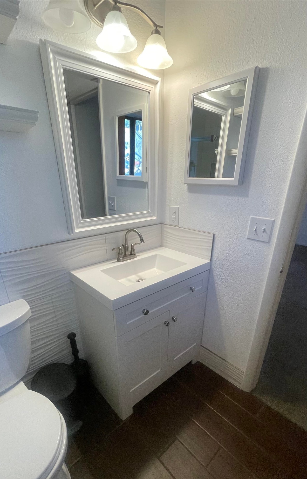 3374 G Road Clifton, CO 81520 - Photo 19 of 24 a bathroom with a sink toilet and mirror