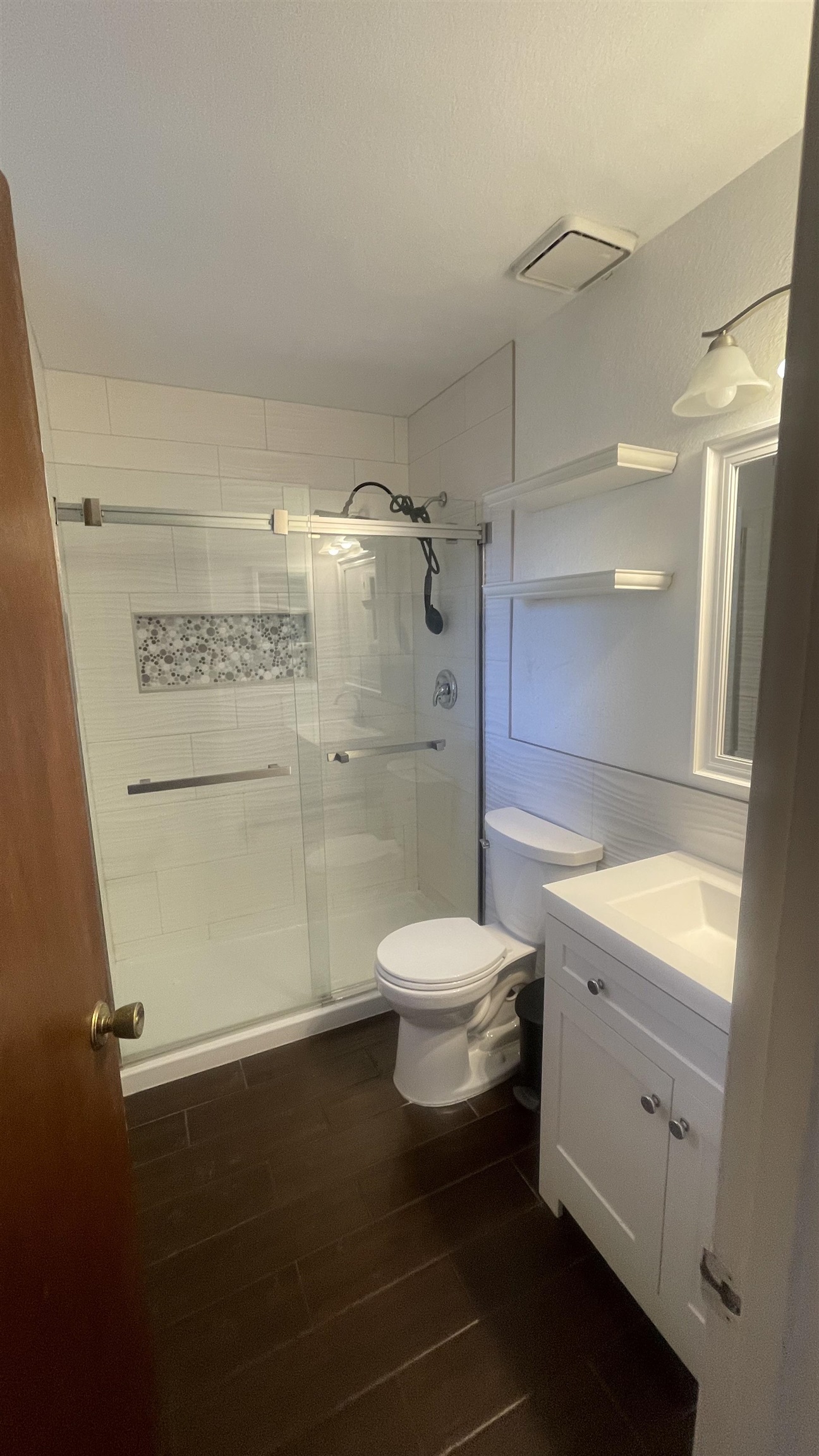 3374 G Road Clifton, CO 81520 - Photo 20 of 24 a bathroom with a toilet a sink and shower