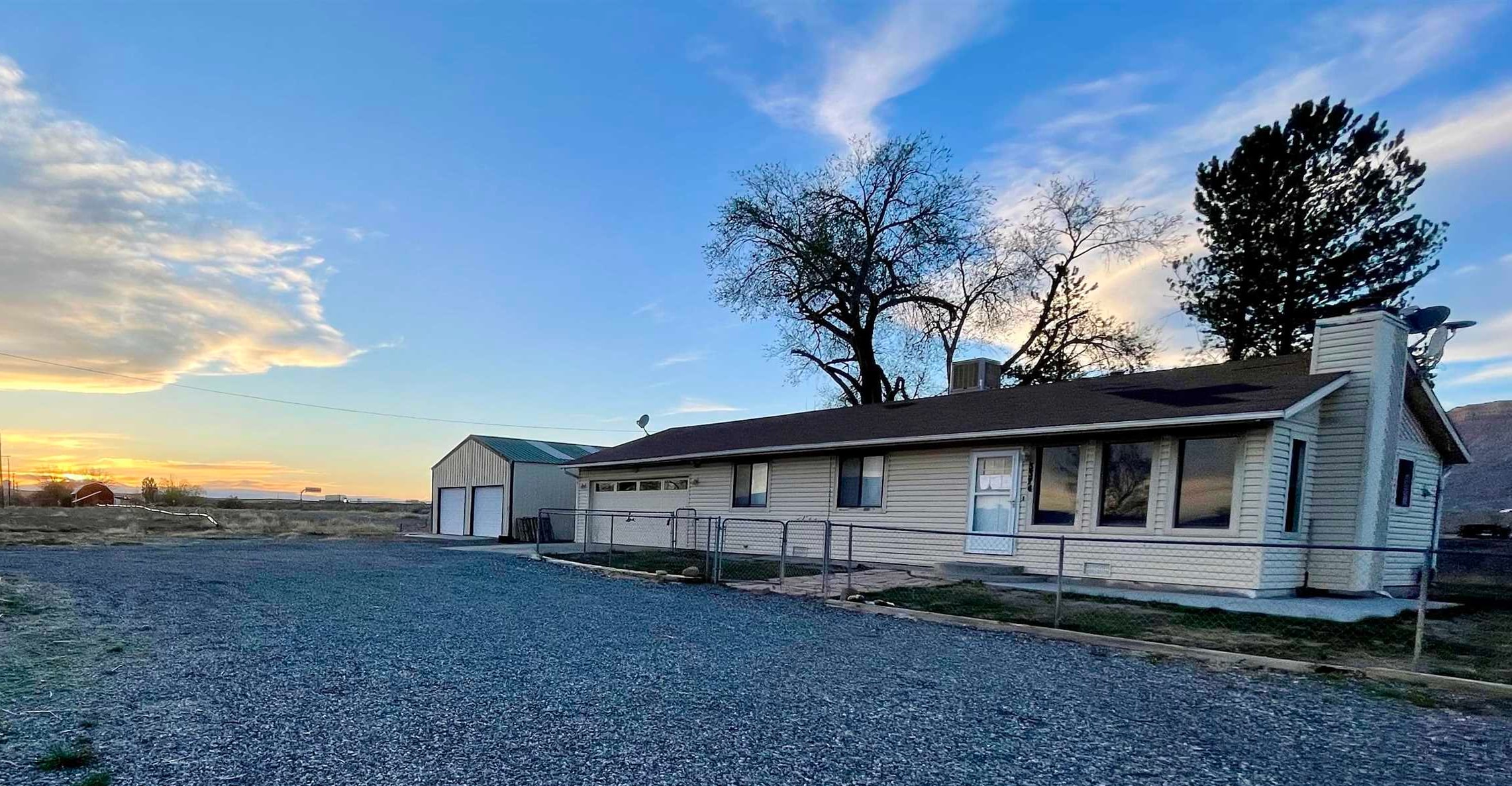 3374 G Road Clifton, CO 81520 - Photo 3 of 24 a view of a house with a yard