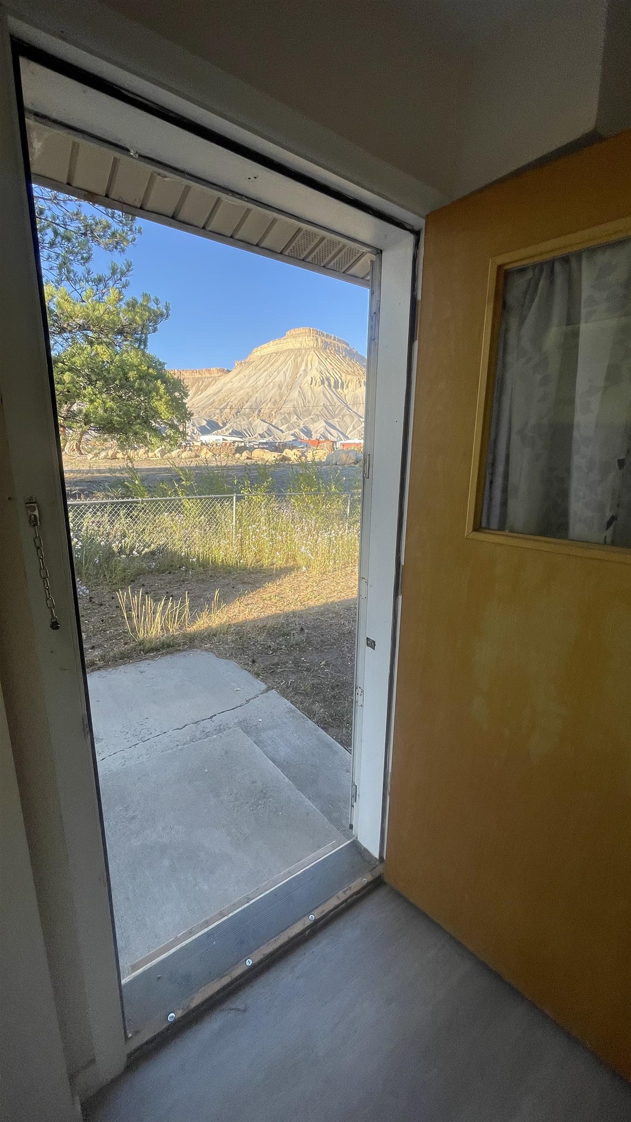 3374 G Road Clifton, CO 81520 - Photo 9 of 24 a view of a glass door and a window