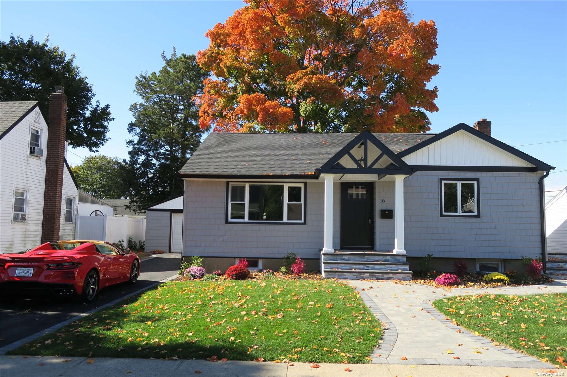 18 Devon Road Bethpage, NY 11714 - Photo 1 of 1 a front view of a house with a yard