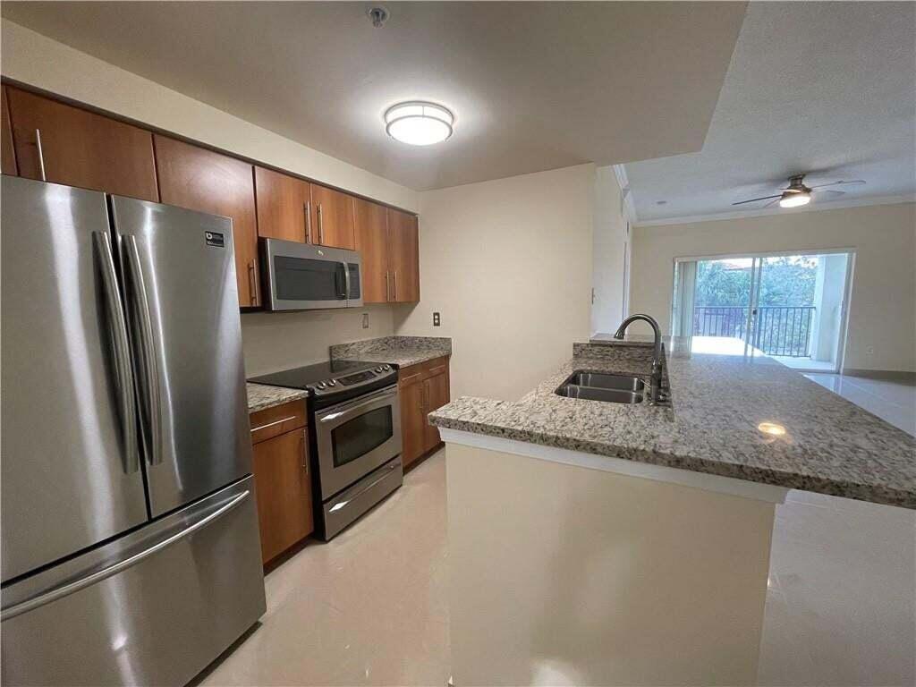 5820 West Sample Road, Unit 305 Coral Springs, FL 33067 - Photo 7 of 29 Kitchen