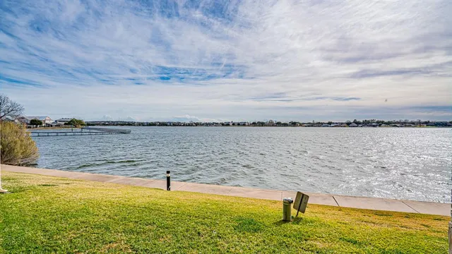 a view of a balcony with furniture