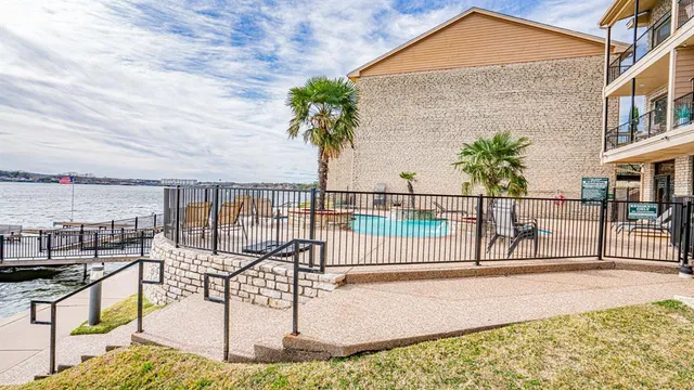 a view of a lake with a big yard