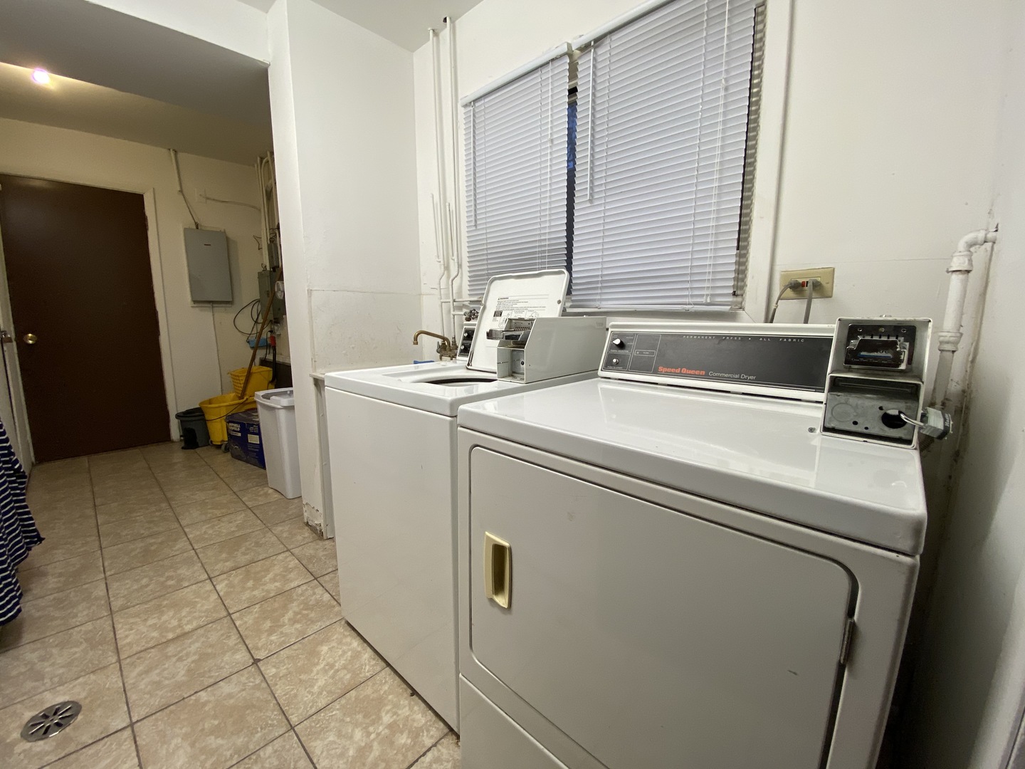 9368 Golf Road, Unit 1A Des Plaines, IL 60016 - Photo 14 of 21 a utility room with dryer and washer