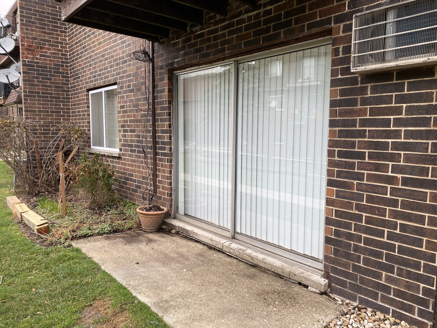 9368 Golf Road, Unit 1A Des Plaines, IL 60016 - Photo 16 of 21 a view of a door and brick wall