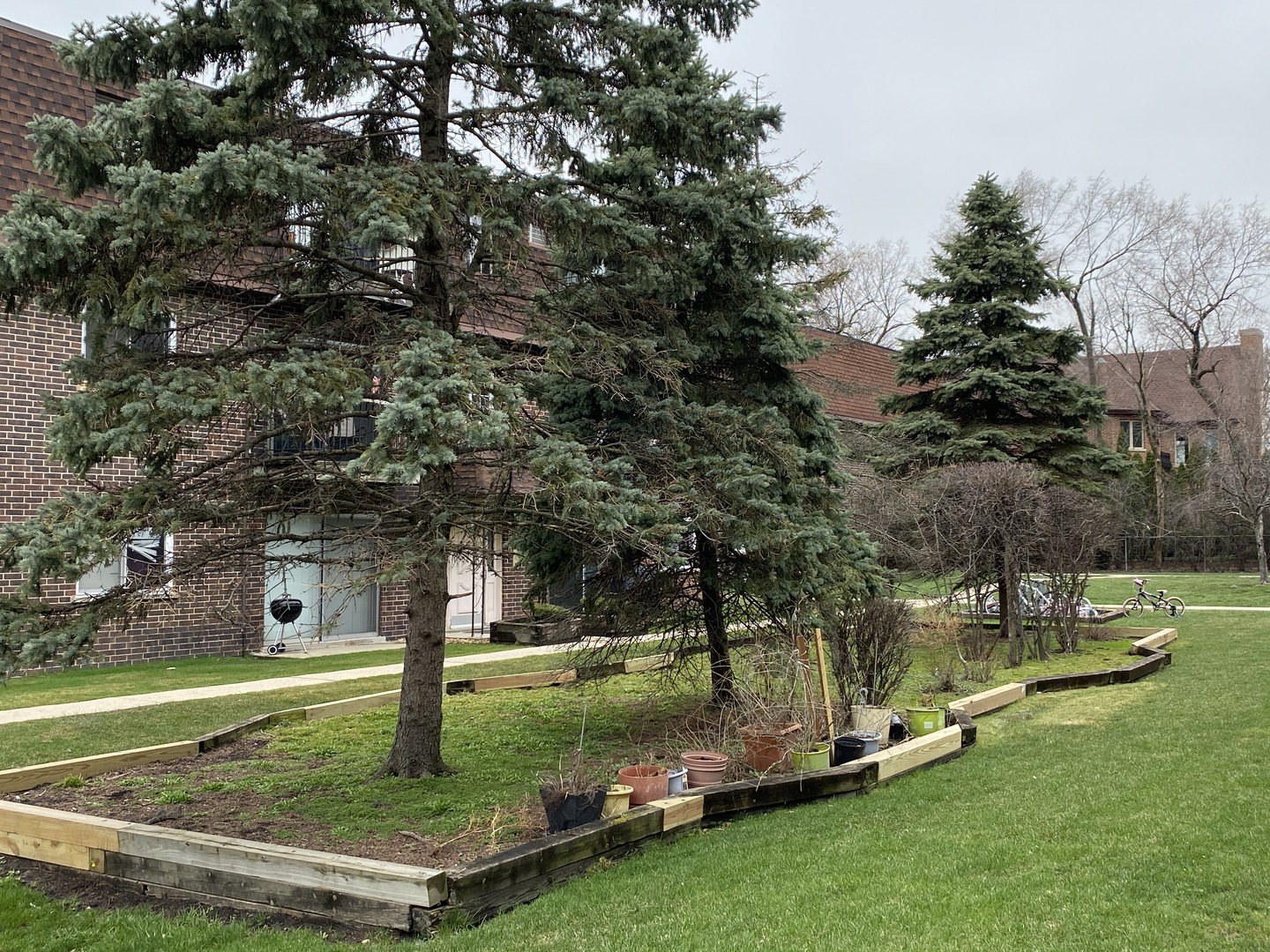 9368 Golf Road, Unit 1A Des Plaines, IL 60016 - Photo 19 of 21 a view of a house with a yard