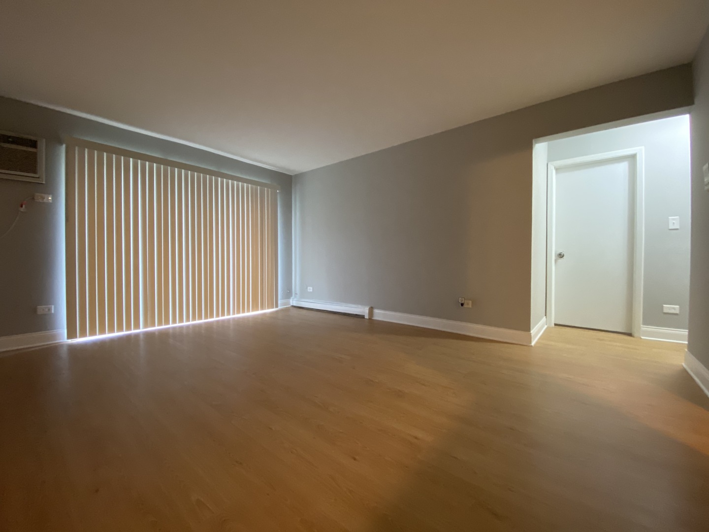 9368 Golf Road, Unit 1A Des Plaines, IL 60016 - Photo 4 of 21 a view of an empty room with a window
