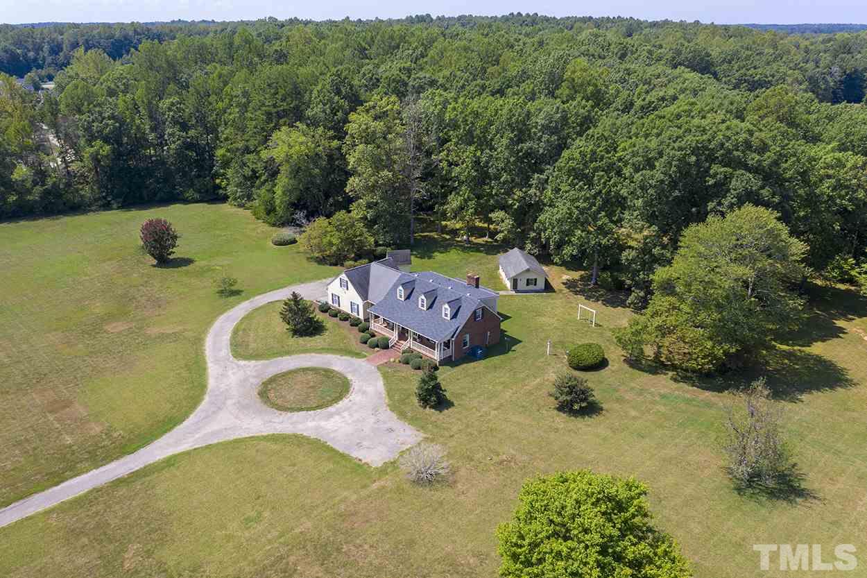 3322 Dick Holeman Road Timberlake, NC 27583 - Photo 1 of 30 an aerial view of a house with a yard