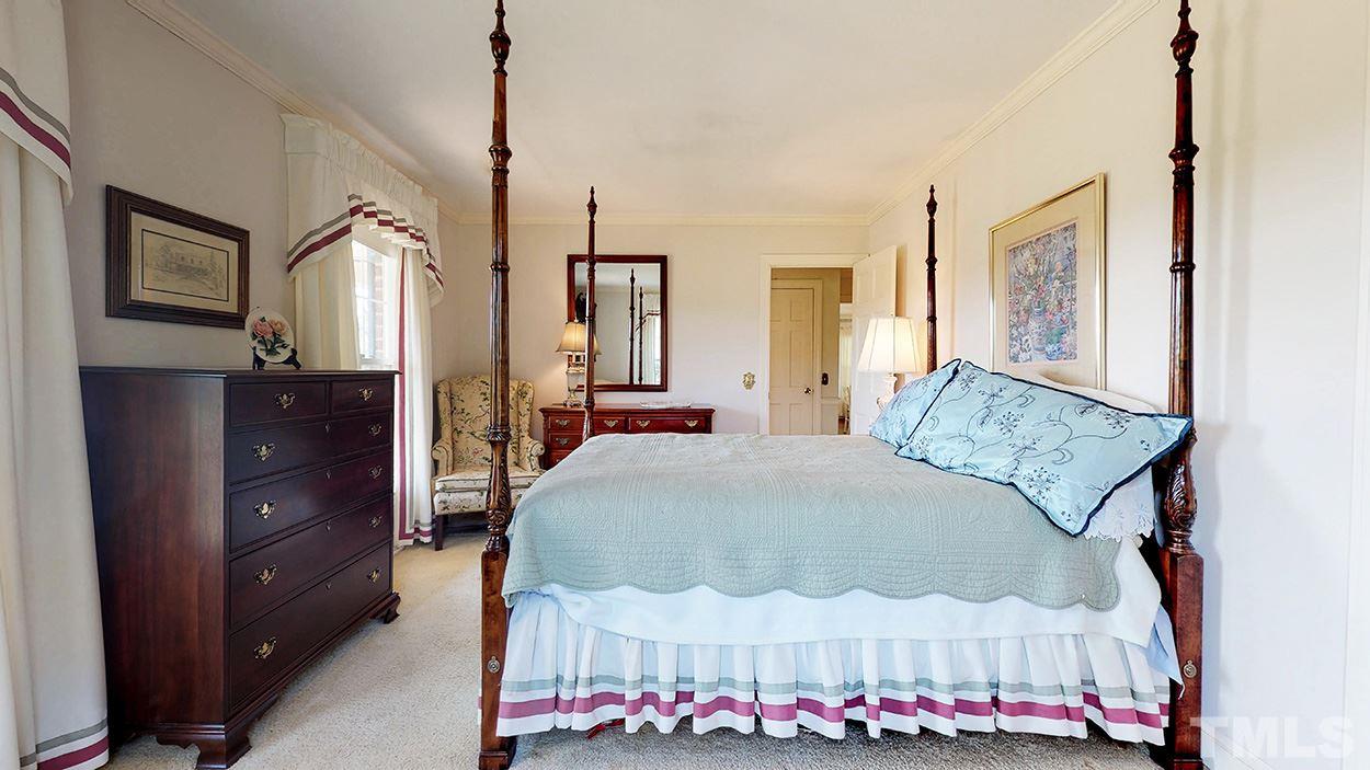 3322 Dick Holeman Road Timberlake, NC 27583 - Photo 14 of 30 a bed room with a bed and a dresser