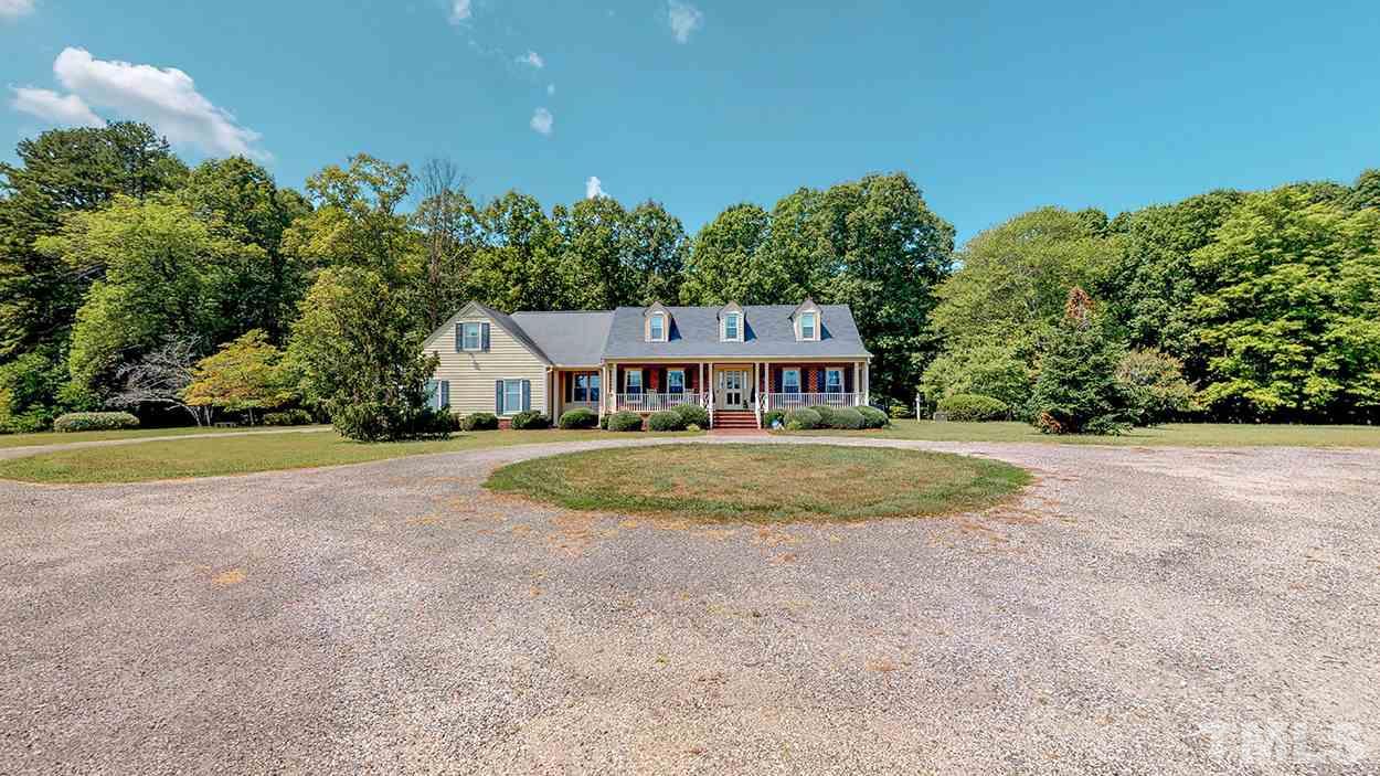 3322 Dick Holeman Road Timberlake, NC 27583 - Photo 20 of 30 a view of house with outdoor space and swimming pool
