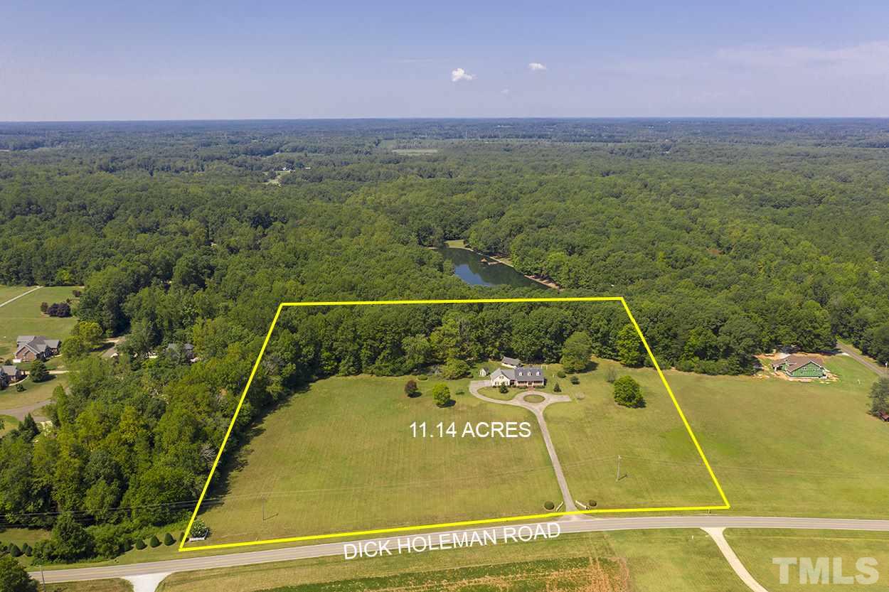 3322 Dick Holeman Road Timberlake, NC 27583 - Photo 3 of 30 a view of a swimming pool with a yard