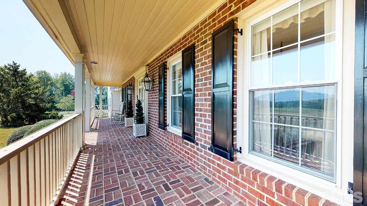 3322 Dick Holeman Road Timberlake, NC 27583 - Photo 4 of 30 a view of a house with a large window