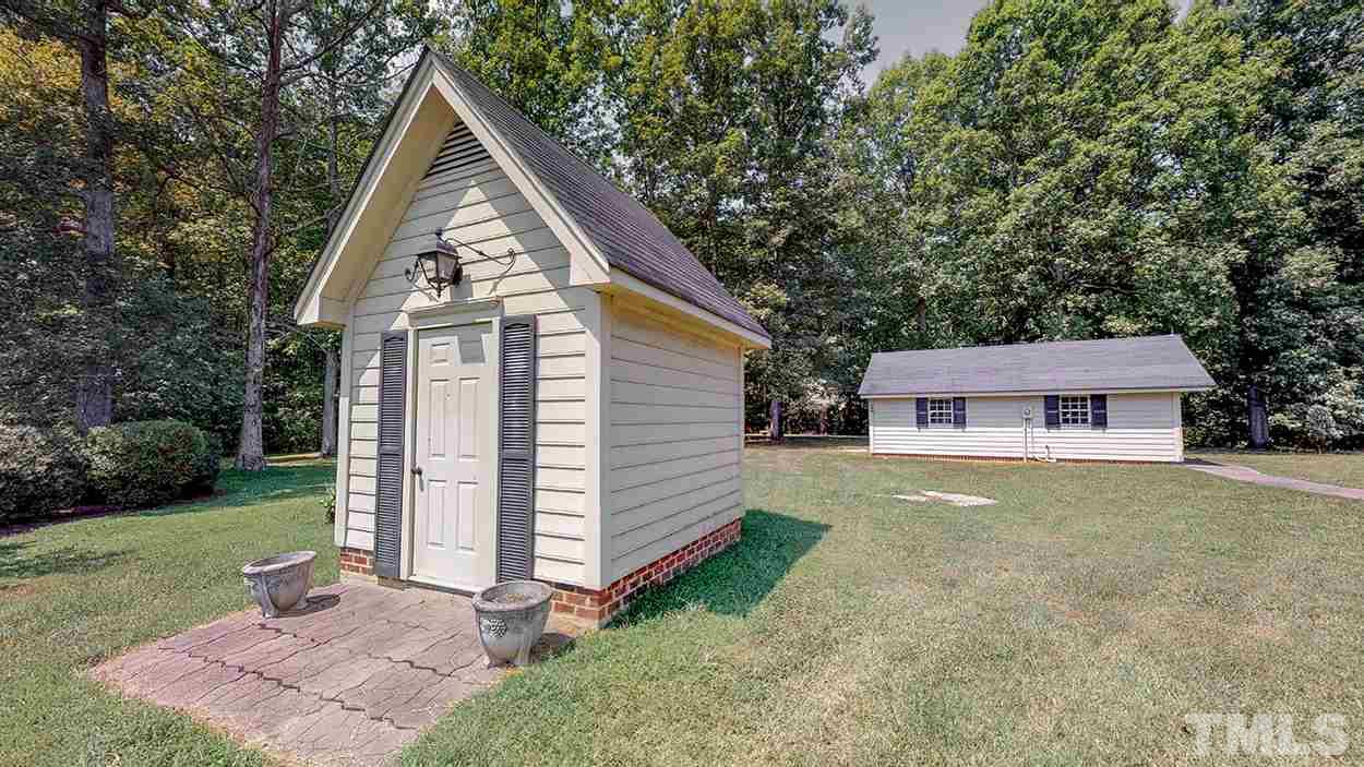 3322 Dick Holeman Road Timberlake, NC 27583 - Photo 7 of 30 a view of a house with a yard