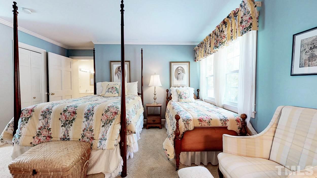 3322 Dick Holeman Road Timberlake, NC 27583 - Photo 10 of 30 a bedroom with bed and a window